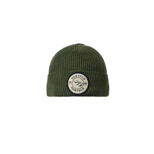 Military green adult beanie offers the ideal balance of natural insulation, breathability, and long-lasting wear. One size fits all with a classic Huntech badge front and centre on this recycled blend rib knit beanie. Ships from Australia.