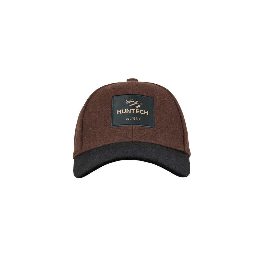 Front view of six panel, worsted wool felt cap with crown in brown and peak in black. Square Huntech logo on a military green background is stitched to the front of the crown. This product ships from Australia.