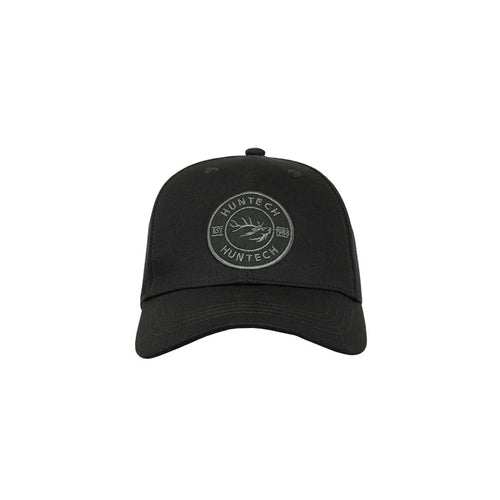 A black cap with an embroidered dark grey Huntech badge on the front, featuring a mid-profile fit with a curved peak.