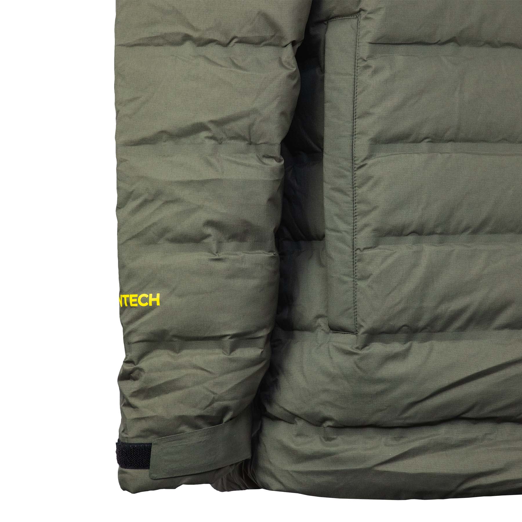 Close up of the bottom of the sleeve with it's adjustable closure and the Huntech logo on the outside edge.