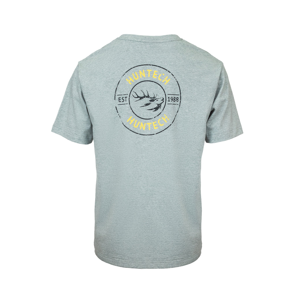 Back view of men’s crew neck tee in organic mid-weight cotton. Features Huntech artwork across upper back with Huntech, the stags head, and est 1988. Ships from Australia and is shown here in grey marle