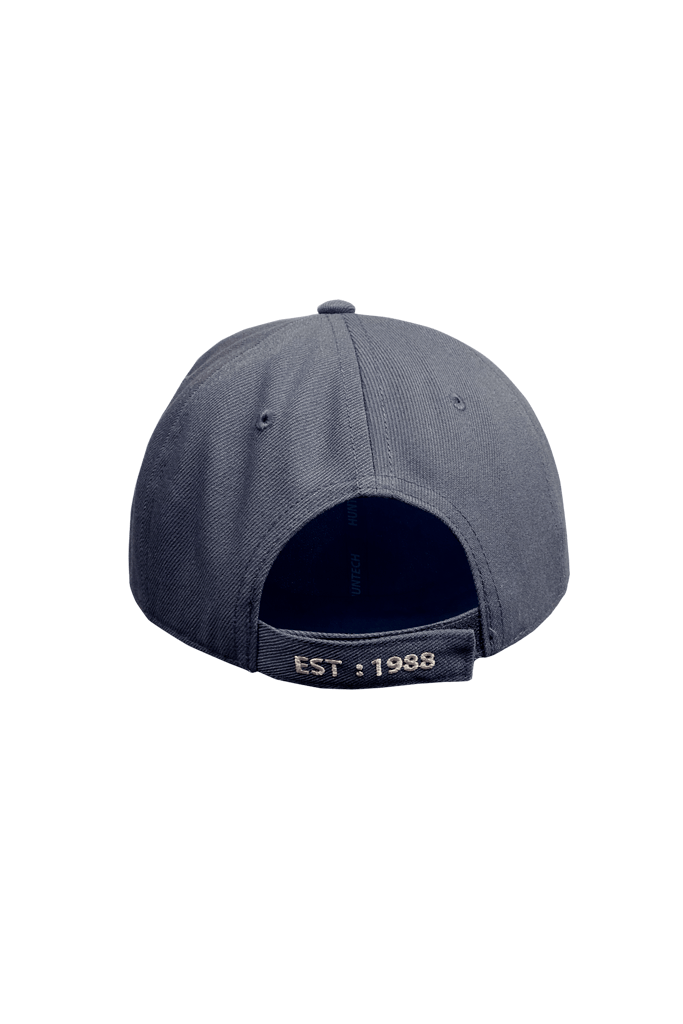 Back view of mid blue 6 panel cap showing the adjustable Velcro strap qith 1988 on there. One size fits most with a classic Huntech badge front and centre on this acrylic twill cap. Ships from Australia.
