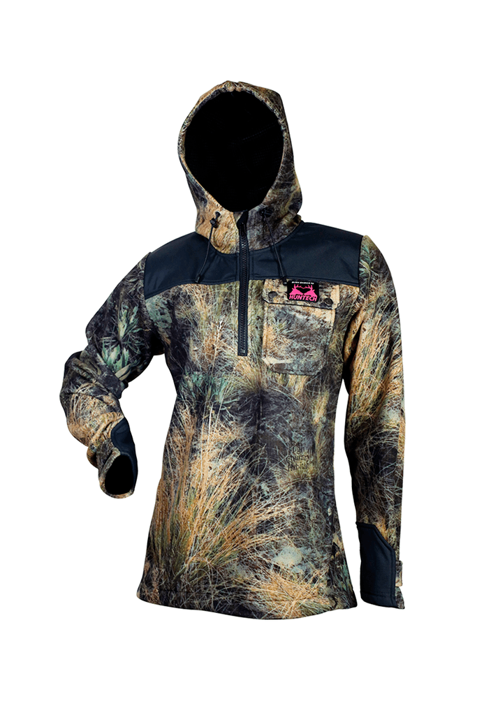 Front image of women’s bush basics G2 coat with zip neck entry. They feature a chest pocket with the double Huntech stags head logo in pink on the pocket flap. Shown in high country camo pattern, this product ships from Australia.
