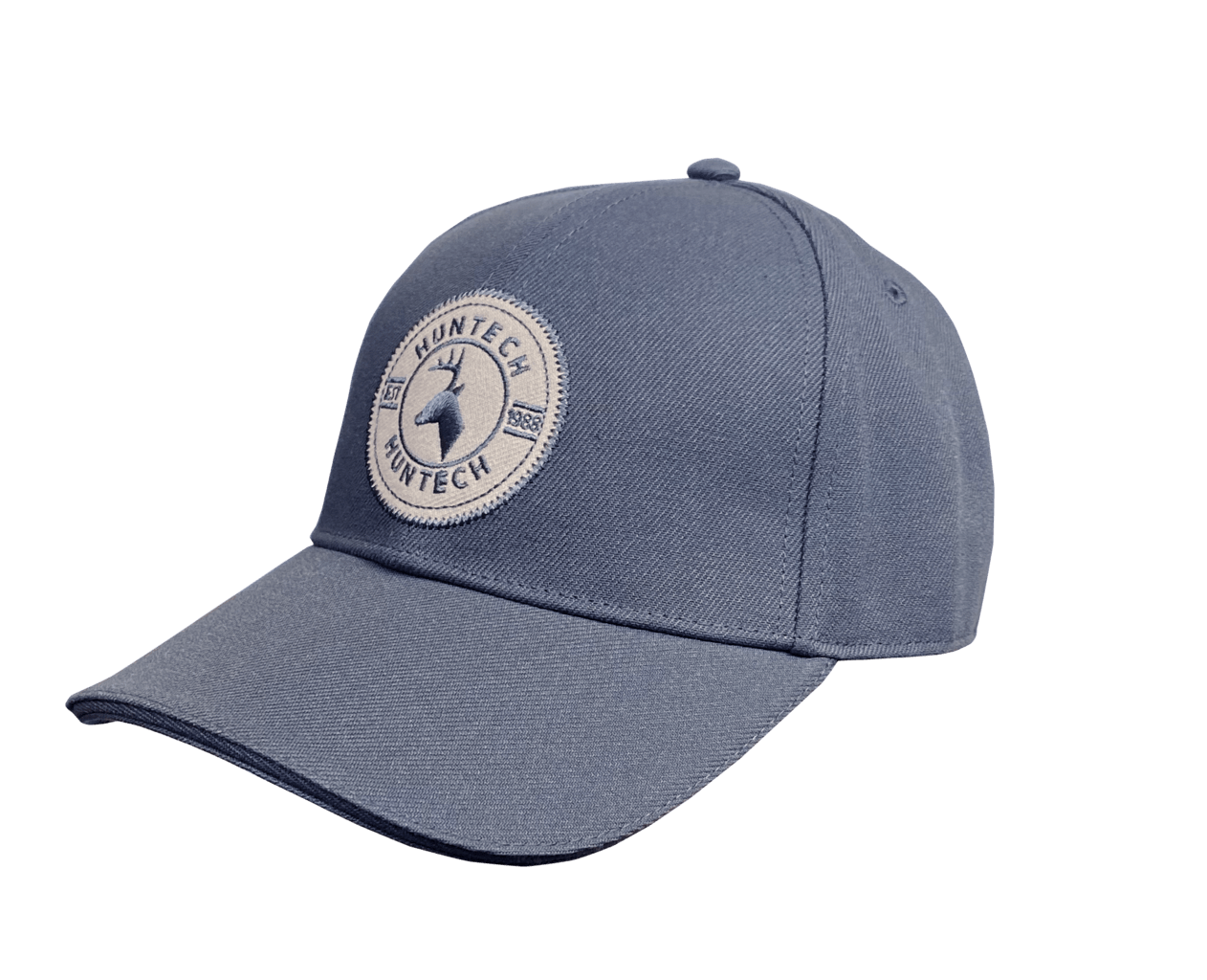 Close up of mid blue 6 panel cap comes with a pre-curved brim and Velcro adjustment strap. One size fits most with a classic Huntech badge front and centre on this acrylic twill cap. Ships from Australia.