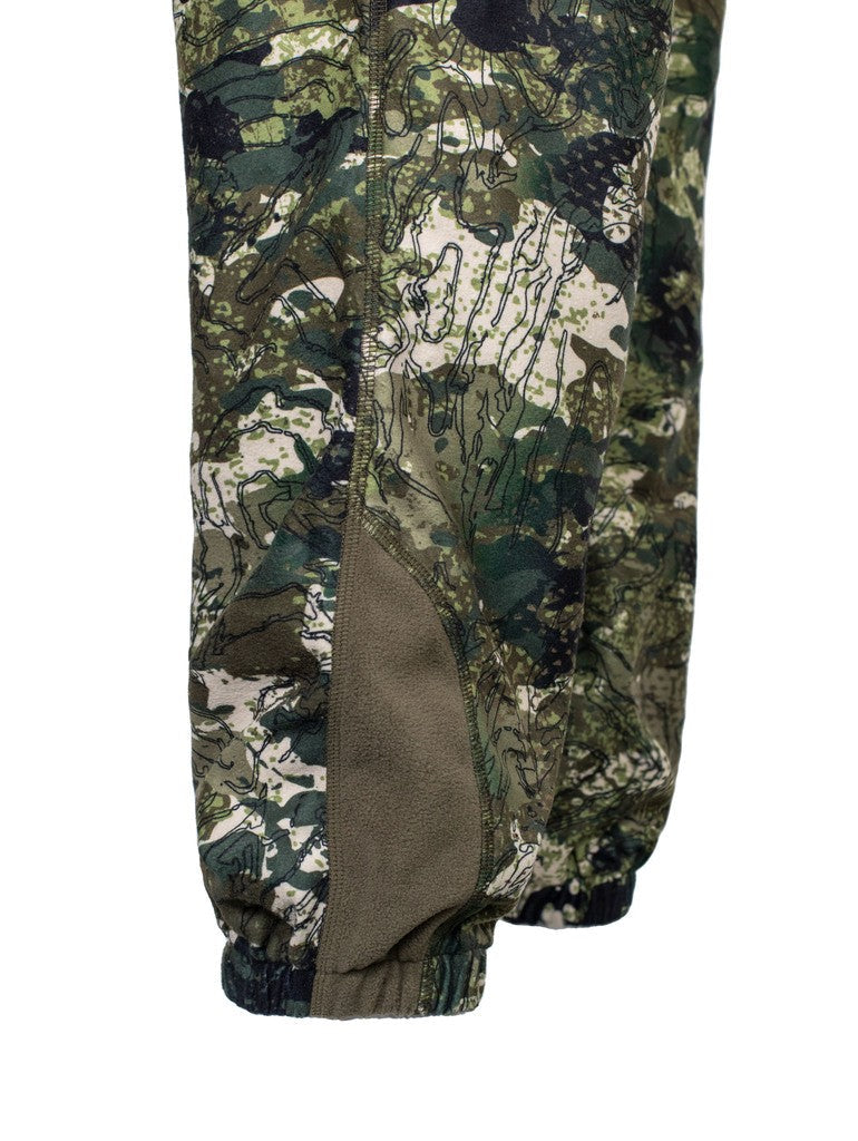 Close up of men’s bush pant bottoms  in 180gsm high grade anti-pill finished fleece with elasticated leg opening for comfort and heat retention. Constructed using flatlock reinforced seams for strength and comfort, and shown in kakariki camo pattern. Ships from Australia.