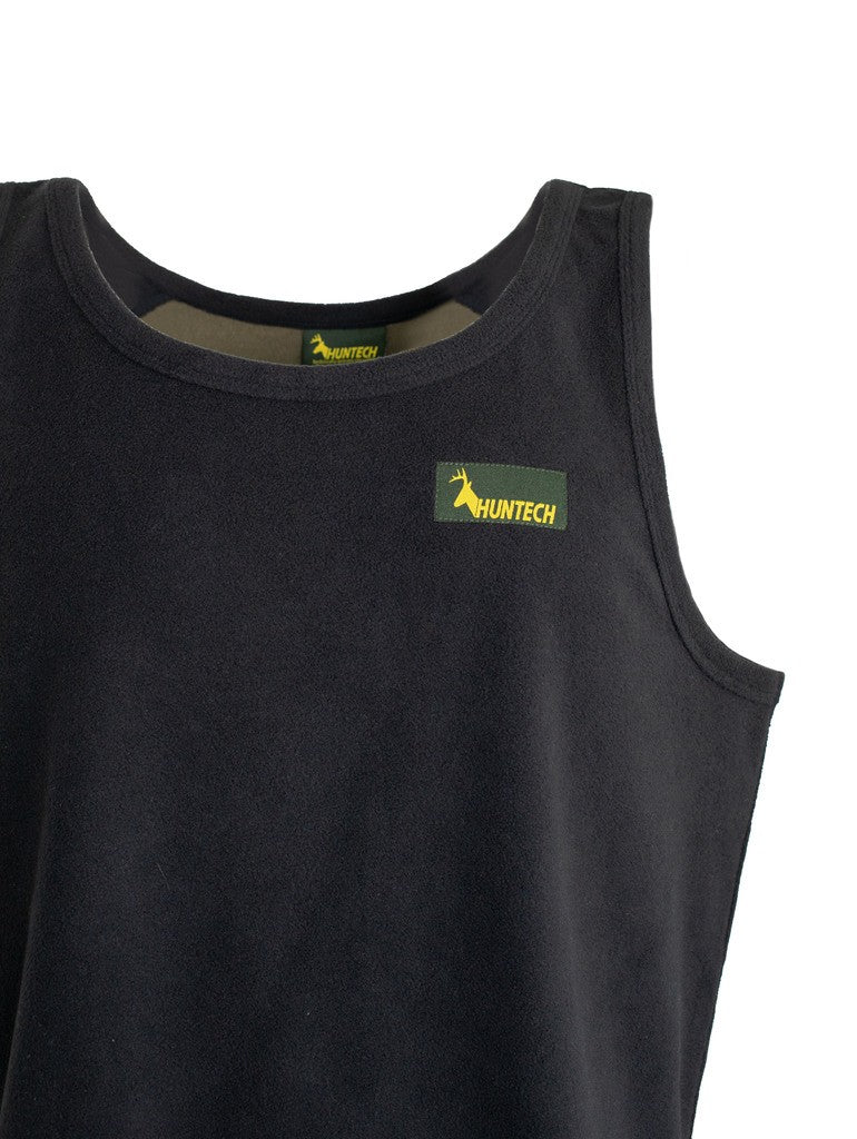 Close up of Three quarter view of Men’s bush singlet in 180gsm high grade anti-pill finished fleece with low cut crew neckline, athletic cut for ease of movement, and constructed using flatlock reinforced seams for strength and comfort, it features a yellow Huntech logo on the left breast. Shown in military green/ black. Ships from Australia.