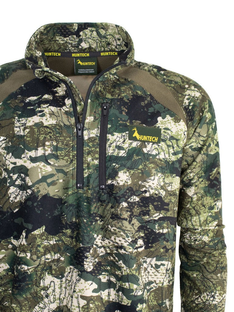 Close up of front view of men’s bush sweatshirt in 180gsm high grade anti-pill finished fleece with turtleneck, half zip entry and protective guard. It features the Huntech logo on the breast. Shown in Kakariki camo pattern. Ships from Australia.