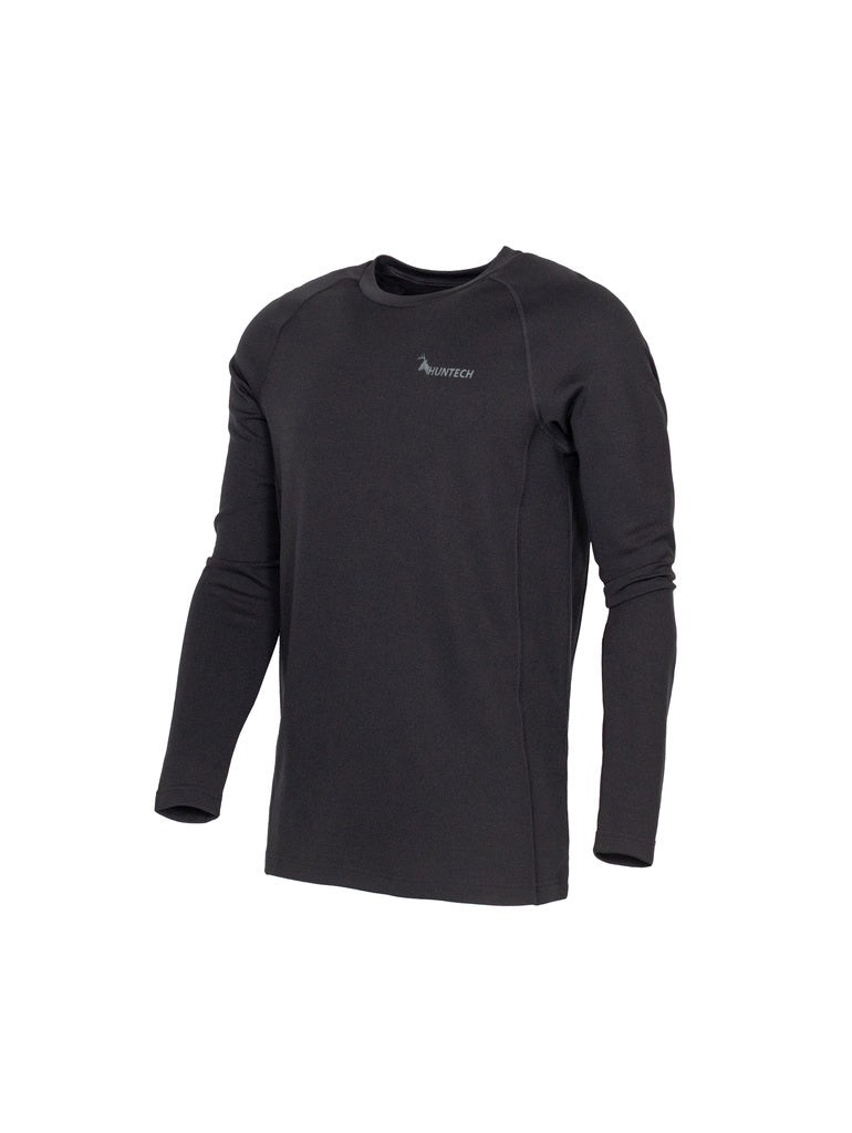 Three quarter view of men’s slim fit, moisture wicking, merino long sleeved top in a 220 gsm 54% NZ Merino / 46% Nylon mix with a nylon outer and relaxed hem. Huntech logo features on front left breast in soft grey. Ships from Australia and shown in black