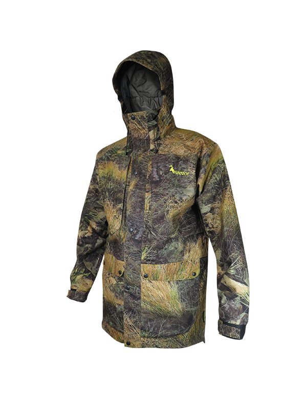Front view of men’s waterproof hunting jacket in brushed tricot fabric with a microlite outer, four large pockets and neoprene cuffs. Front closure with YKK 2 way full zip, this jacket is fully seam sealed. Ships from Australia and is shown in high-country camo pattern with a Huntech logo in bright yellow on the left breast.