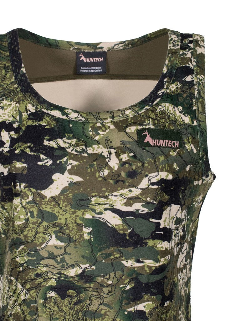 Close up view of women’s bush singlet in 180gsm high grade anti-pill finished fleece with low cut crew neckline, athletic cut for ease of movement and constructed using flatlock reinforced seams for strength and comfort, it features a rose gold Huntech logo on the left breast. Shown in kakariki camo pattern. Ships from Australia.