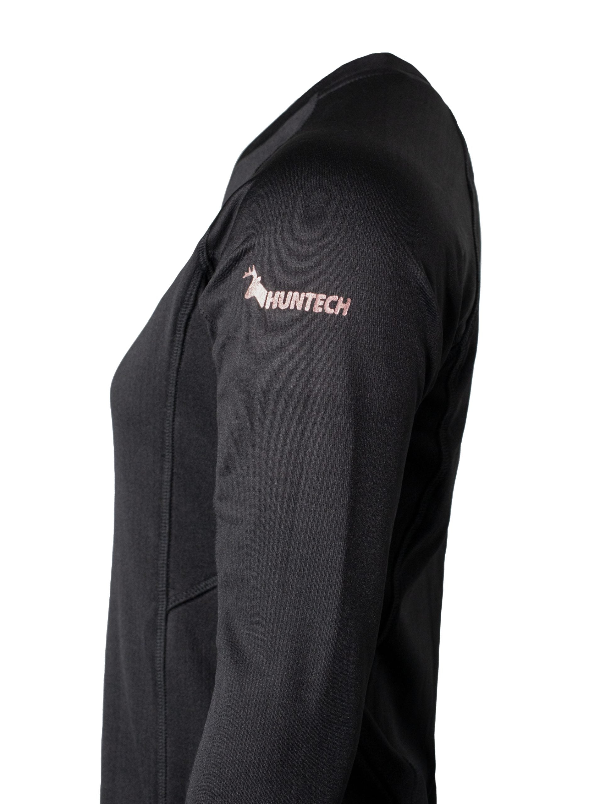 Close up of Huntech logo in rose gold at the top of the left sleeve. Shown on black long sleeved top.