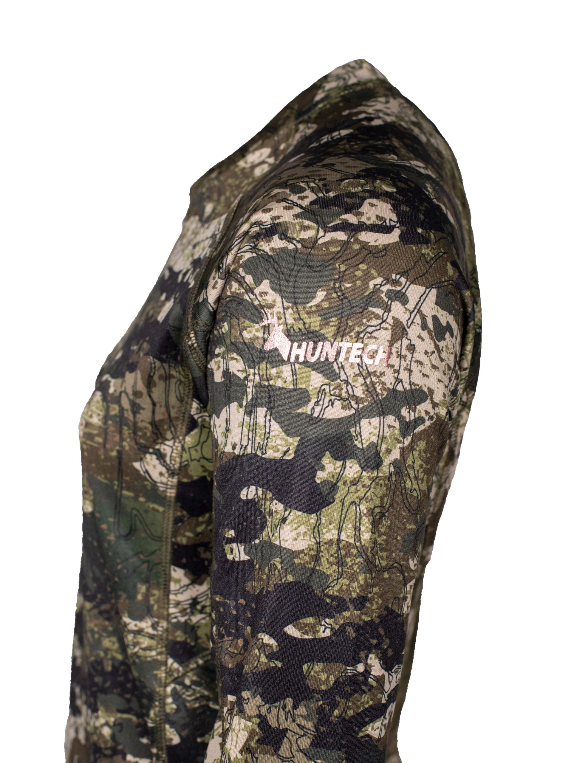 Close up of Huntech logo in rose gold at the top of the left sleeve. Shown on kakariki camo pattern long sleeved top.
