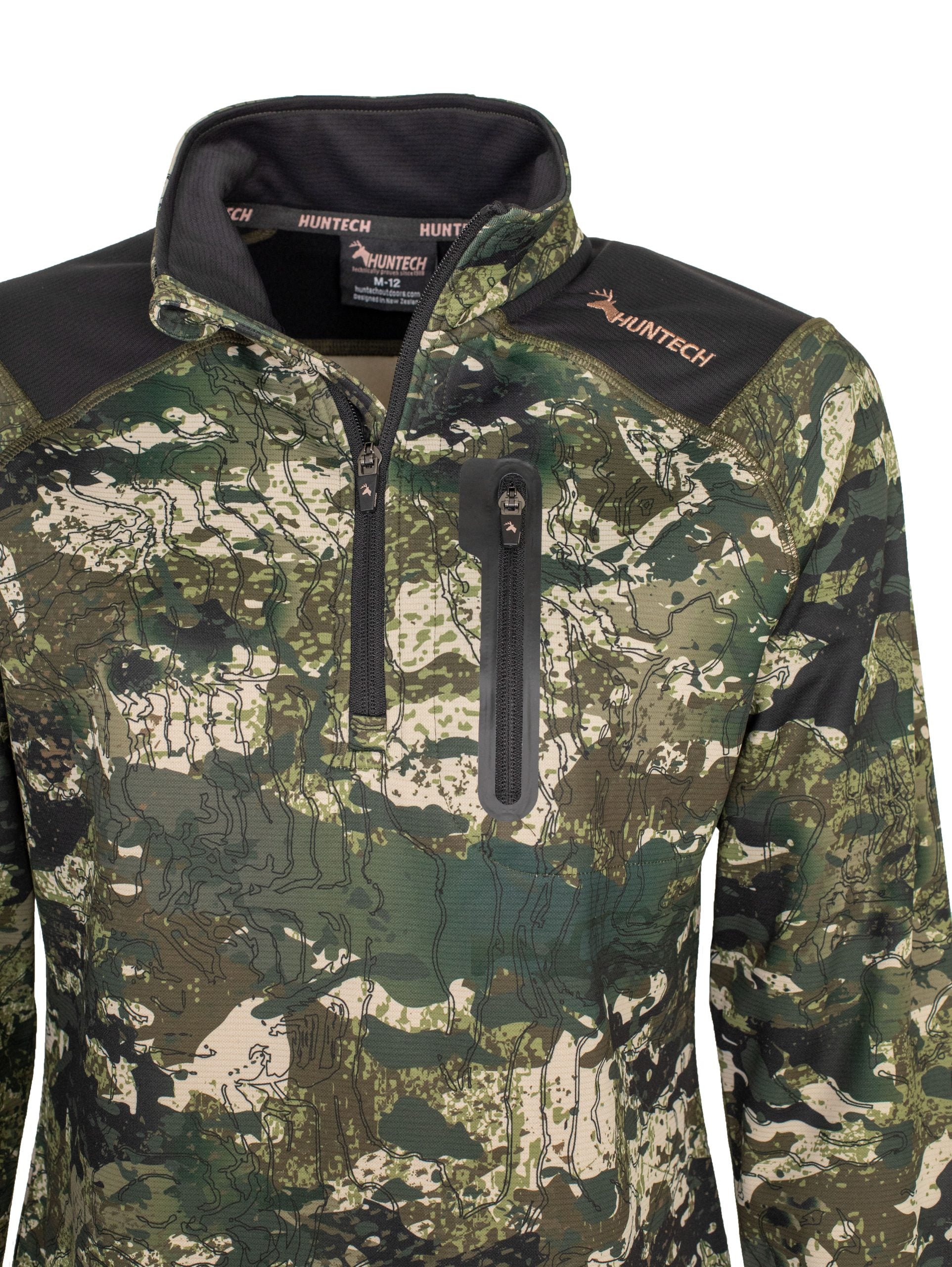 Close up of zippered chest pocket, zip front closure and neckline. Huntech logo appears in rose gold on the shoulder. Shown here in kakariki camo pattern.