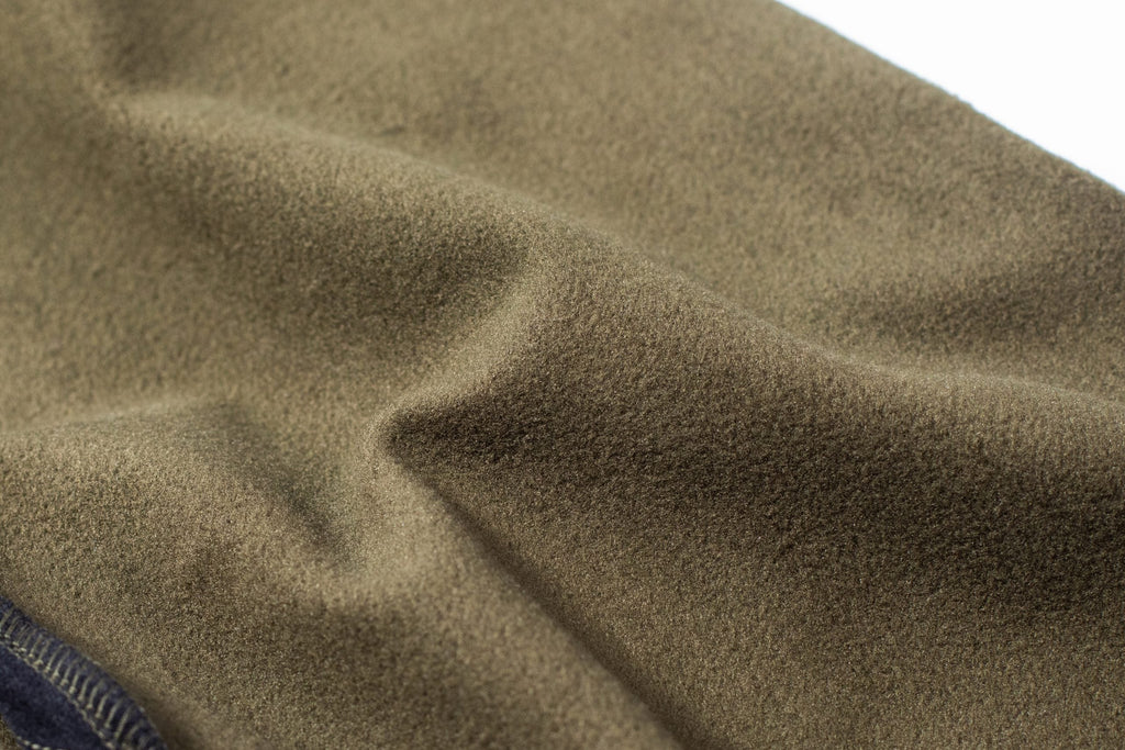 Close up of the inner of the MicroForm fabric. Made of a unique double face weave, the fabric offers you all the benefits and warmth of fleece on the inside.