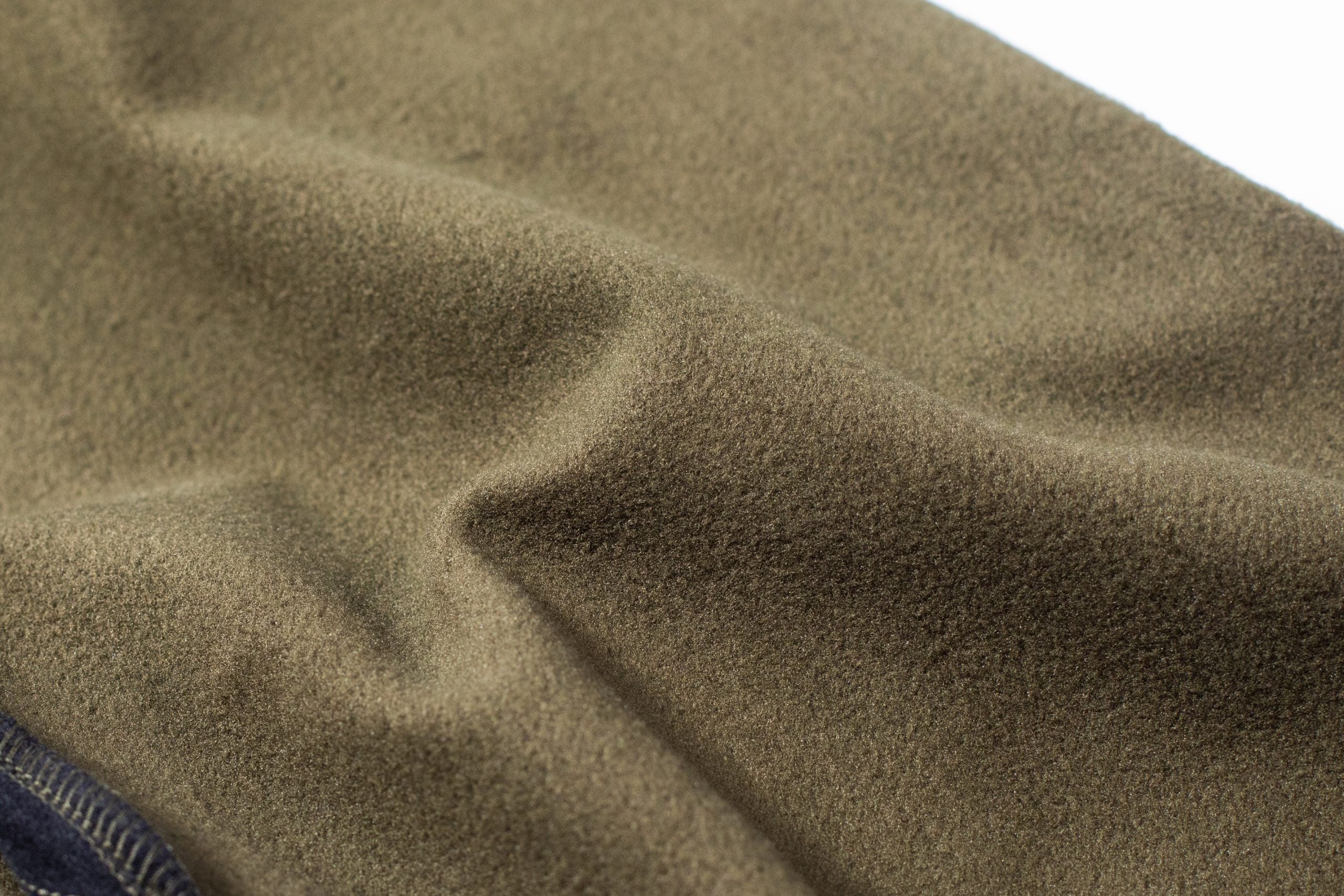 Close up of the inner of the MicroForm fabric. Made of a unique double face weave, the fabric offers you all the benefits and warmth of fleece on the inside.