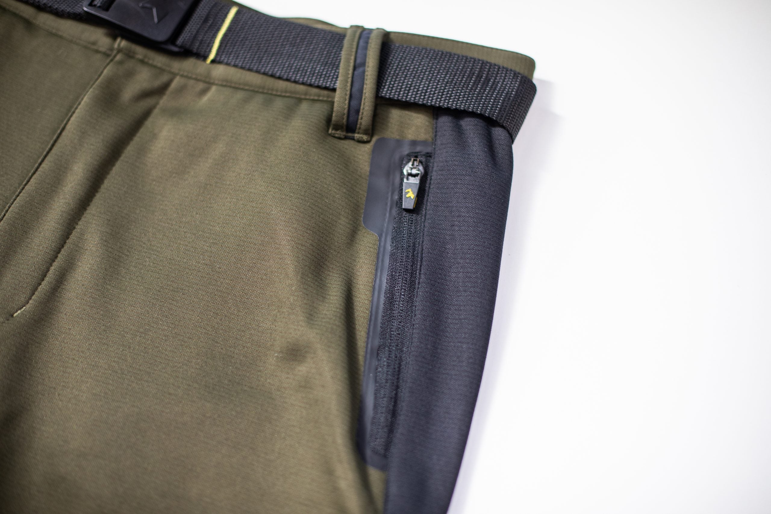 Close up of the zippered side pocket. Pants shown here in military green.