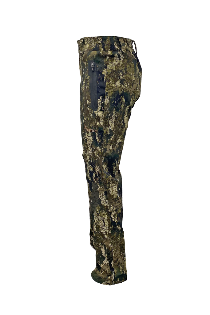 Left side view of pants showing zippered pockets and Huntech logo in rose gold at mid thigh. Shown in kakariki camo pattern.