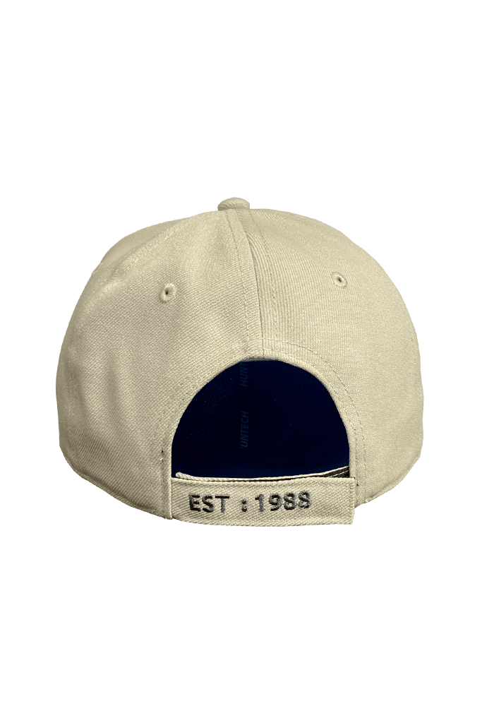 Back view of cream 6 panel cap showing the adjustable Velcro strap qith 1988 on there. One size fits most with a classic Huntech badge front and centre on this acrylic twill cap. Ships from Australia.