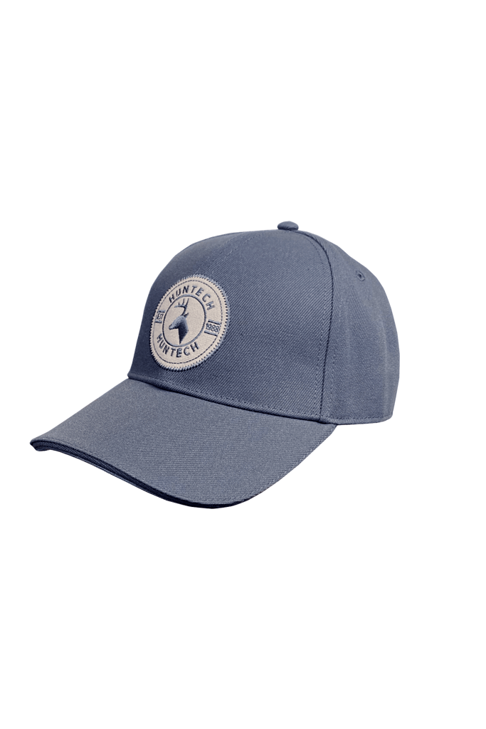Mid blue 6 panel cap comes with a pre-curved brim and Velcro adjustment strap. One size fits most with a classic Huntech badge front and centre on this acrylic twill cap. Ships from Australia.