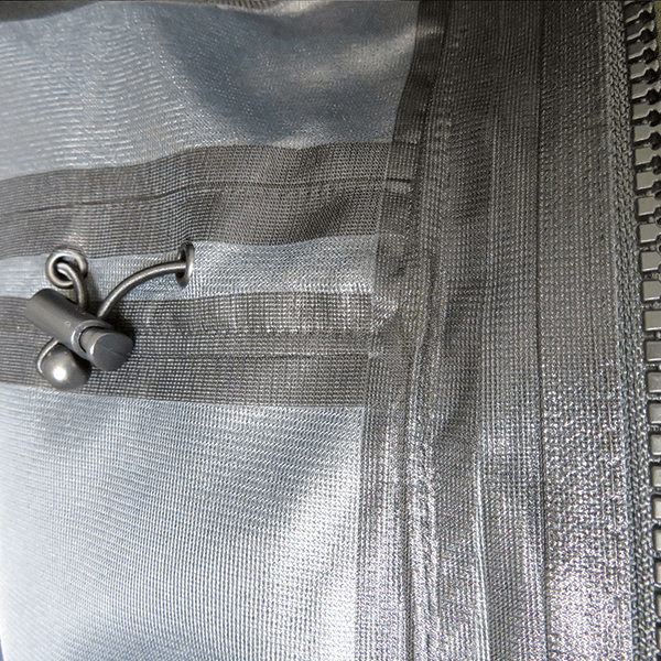 Close up of waist adjuster on interior of jacket allowing for a snug fit.